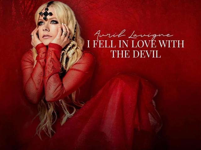 Avril Lavigne's New Music Video For 'I Fell in Love With the Devil' Has A Chilling Vibe